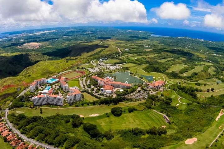 a view of a lush green hillside